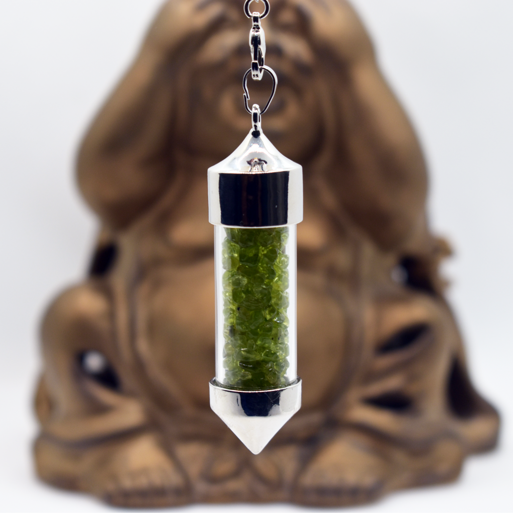 clear glass filled peridot stone pendulum